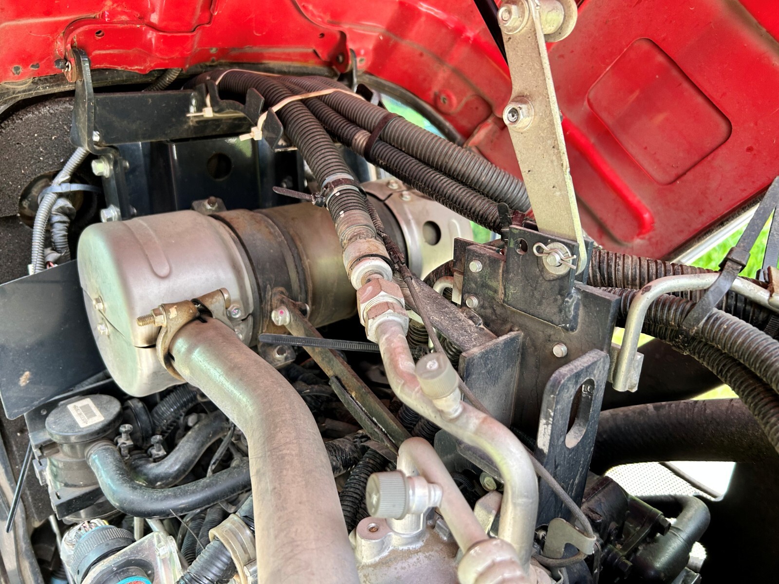 2019 MASSEY FERGUSON 1750M WITH 66″ GRAPPLE, IGLAND WINCH, 5′ FORKS & BUCKET